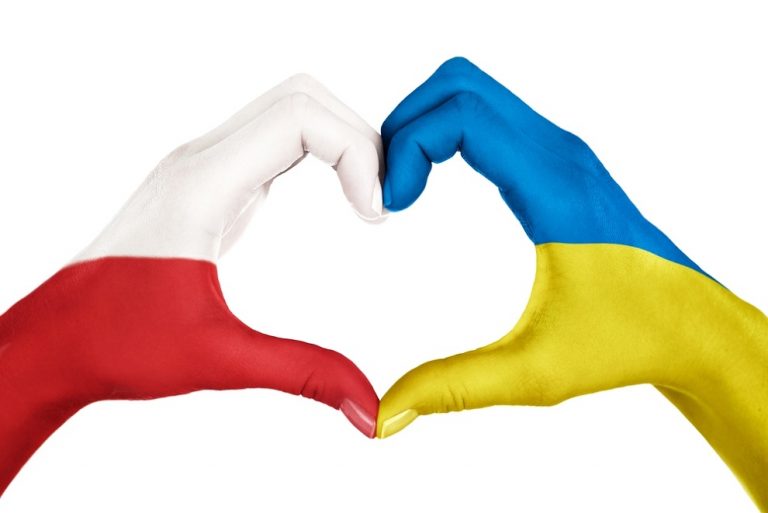 Human,Hands,,Painted,With,Poland,And,Ukraine,Flags,,Forming,Heart